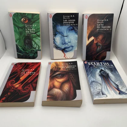 Le Trône de Fer - Tomes 7 à 12 (L'Épée de feu, Les Noces pourpres, La Loi du régicide, Le Chaos, Les Sables de Dorne, Un festin pour les corbeaux) - George R. R. Martin - J'Ai Lu - Livres - Très bon état