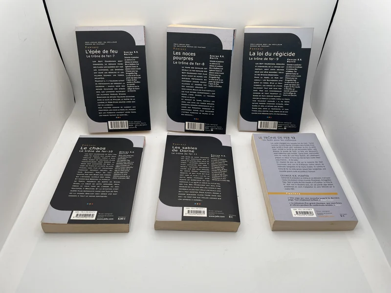 Le Trône de Fer - Tomes 7 à 12 (L'Épée de feu, Les Noces pourpres, La Loi du régicide, Le Chaos, Les Sables de Dorne, Un festin pour les corbeaux) - George R. R. Martin - J'Ai Lu - Livres - Très bon état