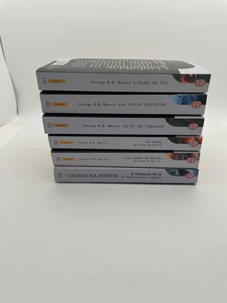 Le Trône de Fer - Tomes 7 à 12 (L'Épée de feu, Les Noces pourpres, La Loi du régicide, Le Chaos, Les Sables de Dorne, Un festin pour les corbeaux) - George R. R. Martin - J'Ai Lu - Livres - Très bon état