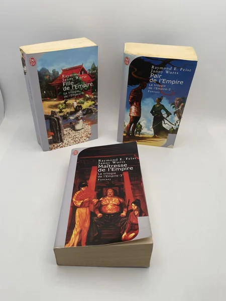 La Trilogie de l'Empire - Tomes 1 à 3 (Fille de l'Empire, Pair de l'Empire, Maîtresse de l'Empire) - Raymond E. Feist / Janny Wurts - J'ai Lu - Livres - Bon état