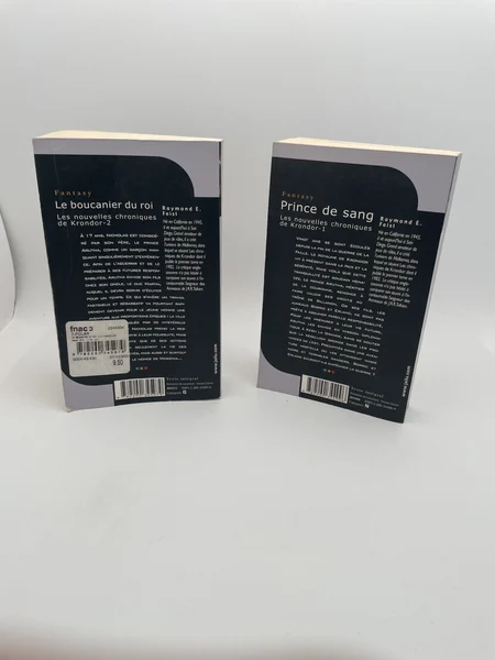 Les nouvelles chroniques de Krondor - Tomes 1 et 2 (Prince de sang, Le boucanier du roi) - Raymond E. Feist - J'ai lu - Livres - Bon état
