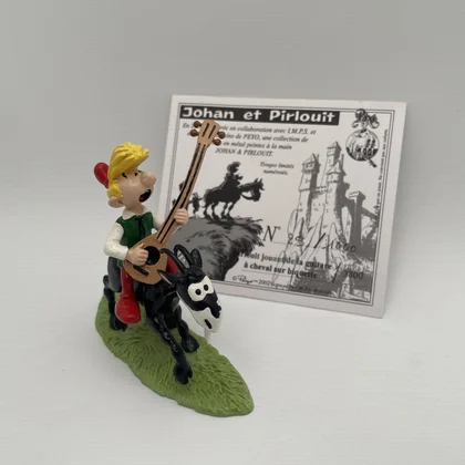 Pirlouit jouant de la guitare à cheval sur biquette - Pixi - Figurines - Très bon état